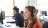 Woman in an office talking on a headset